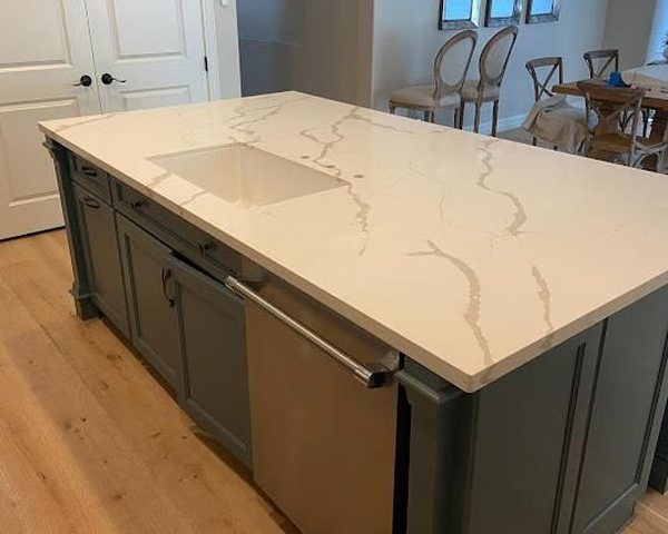 Calacatta quartz island installed by AZ Elite Granite